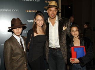 Illustration for article titled Gwyneth Looks Bored, Models Look Hot At Iron Man Premiere